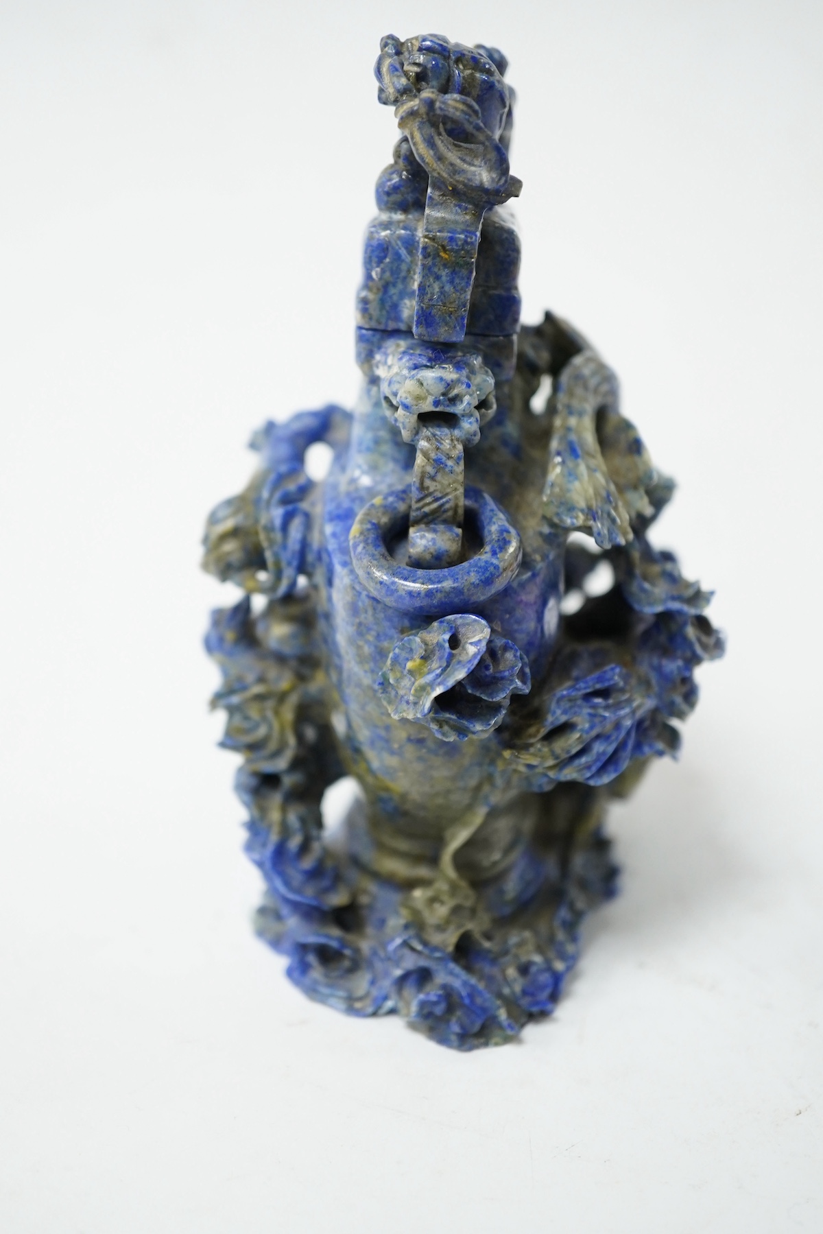 A Chinese lapis lazuli vase and cover, late 19th/early 20th century, 14cm high. Condition - fair, minor chips